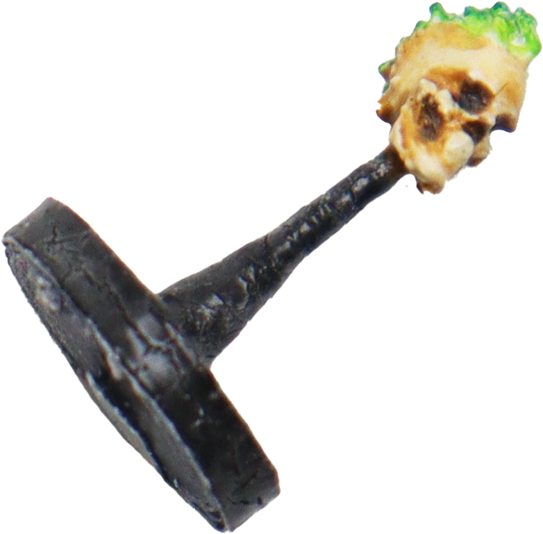 En 3D-utskriven miniatyr av en Flameskull-monster från DnD monsterhandboken, använd under stridssituationer på en rutkarta.